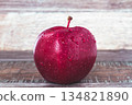 Fresh apple.Juicy ripe apple close-up on a white background. 134821890