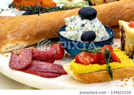 Red wine with charcuterie, cheese, grapes and snacks 134822530