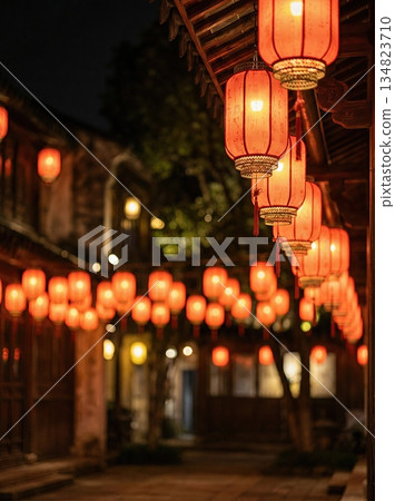 Chinese red lantern in the night of Chinese New Year of happiness. Background of bright traditional Chinese lanterns on the street 134823710
