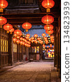 Chinese red lantern in the night of Chinese New Year of happiness. Background of bright traditional Chinese lanterns on the street 134823939
