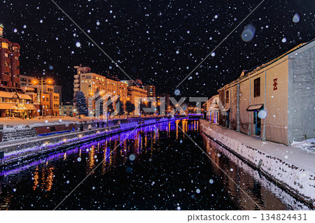 Otaru Canal on a snowy night: A fantastical landscape of warehouses and illuminations Otaru Canal on a snowy night: A fantastical landscape of warehouses and illuminations 134824431