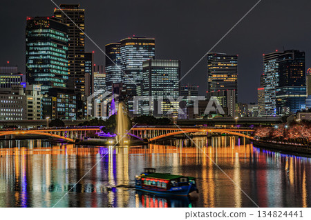 Osaka Tenjinbashi Bridge wrapped in light Night cityscape 134824441