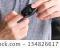 A device to measure the oxygen saturation of a person at the fingertips. And checking oxygen depletion is an emergency sign of pneumonia caused by the COVID-19 virus. 134826617