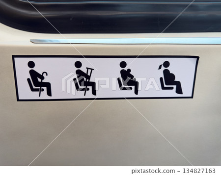 Symbols of people sitting in seats on public transport designed for people with difficulty standing. Signs represent elderly person, injured person, pregnant woman and parent with child Symbols of people sitting in seats on public transport designed for people with difficulty standing. Signs represent elderly person, injured person, pregnant woman and parent with child 134827163