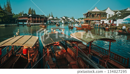 Charming Wooden Boats Nestled by a Scenic Waterway in Historic Village. Zhujiajiao, Shanghai, China 134827295