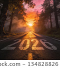 New year 2026 or start straight concept. word 2026 written on the road in the middle of an asphalt road at sunset. Concept of planning and challenge, business strategy, opportunity and new life change 134828826