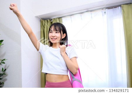 Japanese woman in yoga wear heading to training gym, yoga studio, yoga mat, leggings, trimmed up Japanese woman in yoga wear heading to training gym, yoga studio, yoga mat, leggings, trimmed up 134829171