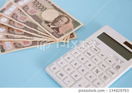Calculator and money Calculator and money 134829763