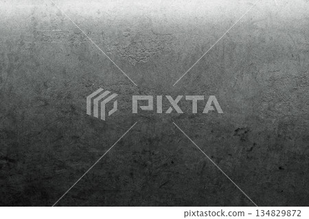 Dark gray concrete wall texture with soft gradient lighting and industrial minimal background. Copy space Dark gray concrete wall texture with soft gradient lighting and industrial minimal background. Copy space 134829872