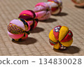 Colorful Temari balls lined up on tatami mats | Traditional Japanese accessories with depth 134830028