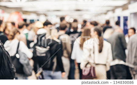 Abstract blurred people at exhibition hall of expo event trade show. Business convention show or job fair. Business concept background. 134830086