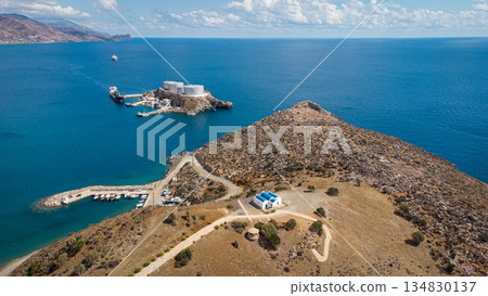 Agios Pavlos Church. Crete. Greece. Kaloi Limenes. Drone Shot. Ship Fuel Tanks. 134830137