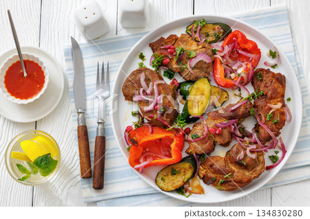 Grilled pork neck chunks with roasted veggies Grilled pork neck chunks with roasted veggies 134830280