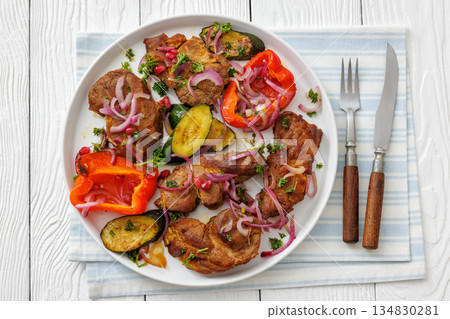 Grilled pork neck chunks with roasted veggies Grilled pork neck chunks with roasted veggies 134830281
