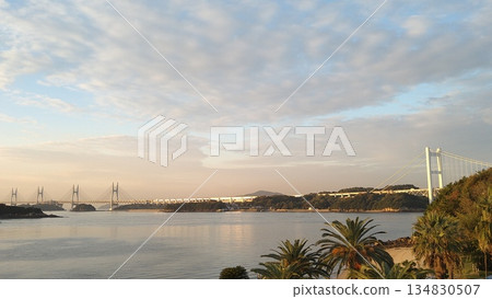 Morning view of Shimotsui Seto Ohashi Bridge spanning the Seto Inland Sea from Mt. Washu 134830507