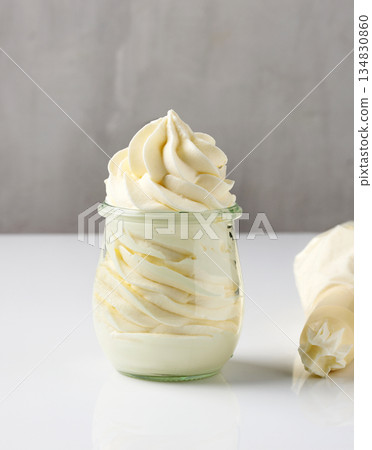 whipped cream in a glass jar whipped cream in a glass jar 134830860