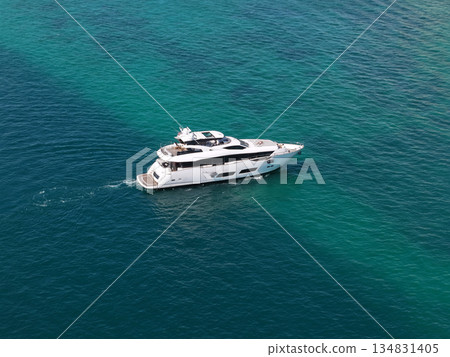 Yachting boat tourism. Luxury lifestyle. Vacation on summer. Yacht at sea. Motorboat yacht sailing at sea. Motorboat aerial top view. Travel destination. Luxury boat motor yacht at sea Yachting boat tourism. Luxury lifestyle. Vacation on summer. Yacht at sea. Motorboat yacht sailing at sea. Motorboat aerial top view. Travel destination. Luxury boat motor yacht at sea 134831405