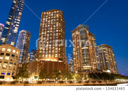 Skyscraper in city downtown. City downtown architecture. Office building in business district. Modern glass building. Chicago city. Skyscraper building architecture. Business skyscraper of glass 134831465