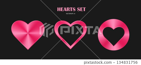 A set of pink metal badges with black hearts on a dark background. A set of pink metal badges with black hearts on a dark background. 134831756