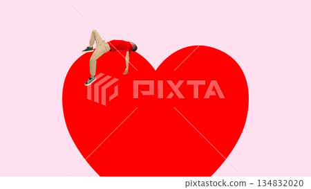 Surreal artwork with man lying on red heart Surreal artwork with man lying on red heart 134832020