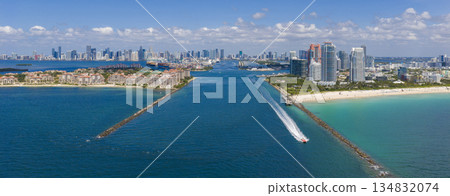 Panorama of Miami skyline. Drone shot of Miami cityscape. Top view of South Miami and the ocean. Miami skyline with skyscrapers and coastline from above. 134832074