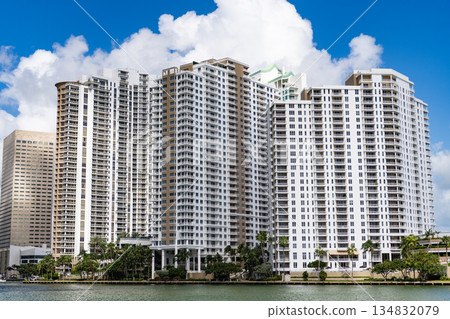 Modern glass building. Skyscraper in business city. City downtown with skyscraper. Office building in business district. Skyscraper building architecture. Brickell Key with iconic skyscraper 134832079