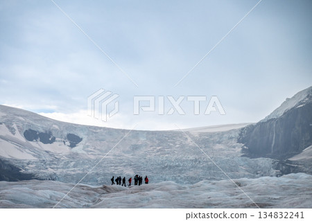 View into the Athabasca Glacier in Jasper National Park with cloudy sky View into the Athabasca Glacier in Jasper National Park with cloudy sky 134832241