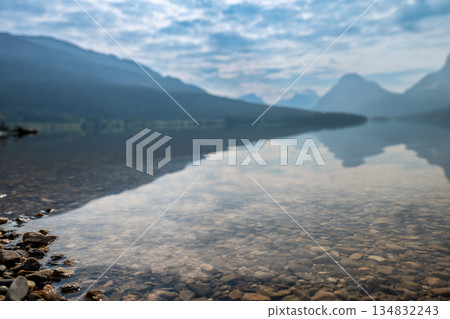 Low angle view of the shoreline of Bow Lake in western Alberta, Canada and part of Banff National Park. Low angle view of the shoreline of Bow Lake in western Alberta, Canada and part of Banff National Park. 134832243