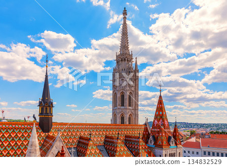 Matthias Church and its roof on Castle Hill, close view at sanny day, Budapest, Hungary Matthias Church and its roof on Castle Hill, close view at sanny day, Budapest, Hungary 134832529