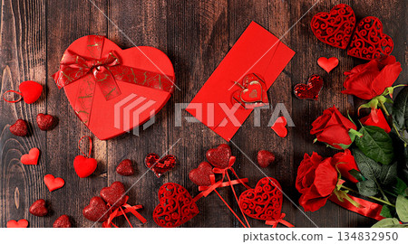 Celebration of Valentine's Day or Women's Day, Mother's Day, banner. Greeting card, roses, hearts and gift boxes on a wooden background, happy holiday, birthday greetings, selective focus 134832950