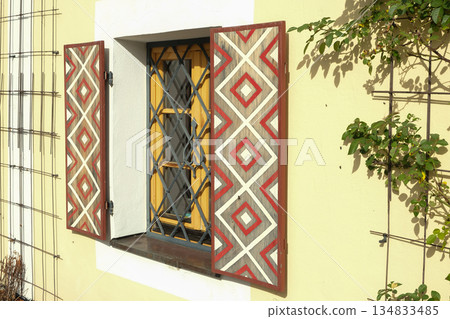 Traditional European House Windows with Shutters 134833485