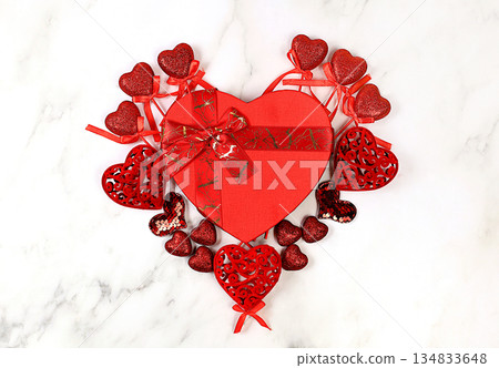 Celebration of Valentine's Day or Women's Day, Mother's Day, banner. Greeting card, set of red hearts on a marble background, congratulations on the holiday, birthday, selective focus 134833648