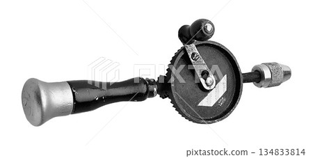 Vintage Rotary Hand Drill with Gear Mechanism isolated on a white background 134833814