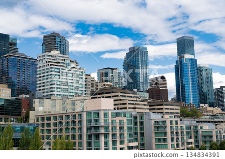 City architecture. Architecture building. City skyscraper. Business skyscraper building. Urban skyline view. Architectural building in business district. Glass skyscraper cityscape perspective 134834391