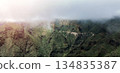 Green mountains and rocks in a foggy weather, scenic landscape with no people. 134835387