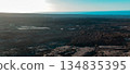 A beautiful landscape with black volcanic ground and lava formations on the island with volcanoes. 134835395