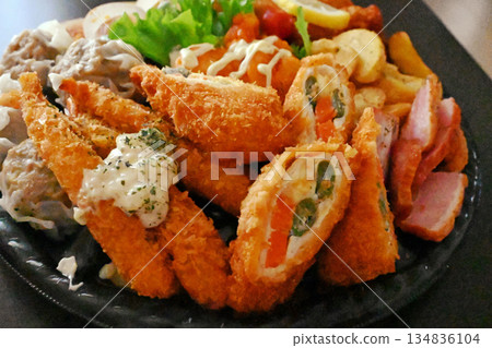 Hors d'oeuvres with lots of side dishes 134836104