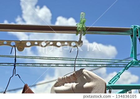 Blue sky, clothesline and rope Blue sky, clothesline and rope 134836105