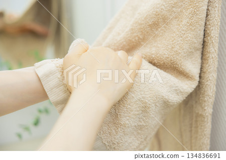 Woman washing hands 134836691