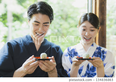 Couple in yukata on the veranda Couple in yukata on the veranda 134836863