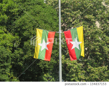 Myanmar Flags Flying Above a Highway 134837153