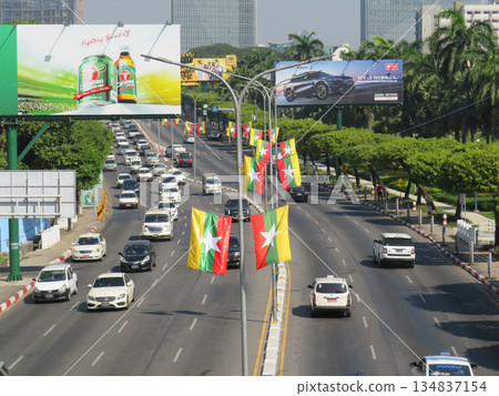 Myanmar Flags Flying Above a Highway 134837154