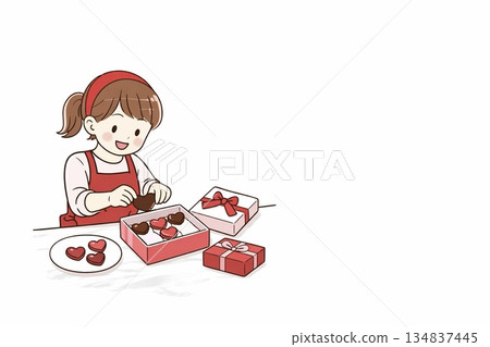 圖:一個女孩正在把糖果放進盒子裡 圖:一個女孩正在把糖果放進盒子裡 134837445