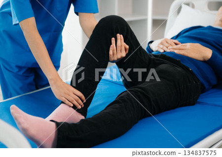 octor consulting with patient Back problems Physical on the bed in clinic therapy concept 134837575