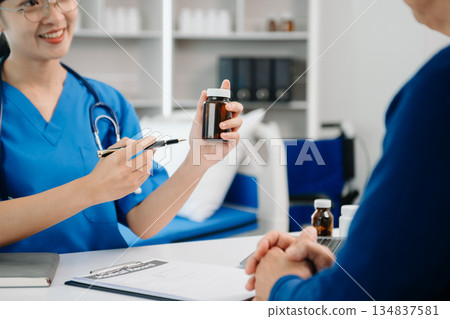 Doctors explain the use of medication to patients. healthcare and medical concept. 134837581