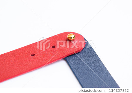 dark blue and red leather strap isolated on white background 134837822