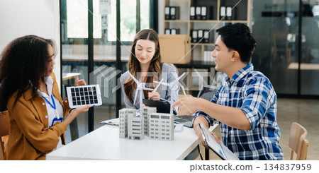 Discussion among businesspeople on the latest developments in solar cell panel technology and Solar Energy Environment city Concept. Discussion among businesspeople on the latest developments in solar cell panel technology and Solar Energy Environment city Concept. 134837959