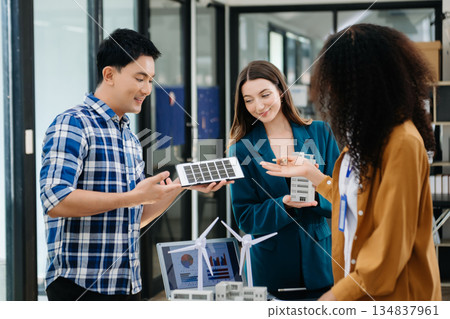 Discussion among businesspeople on the latest developments in solar cell panel technology and Solar Energy Environment city Concept. Discussion among businesspeople on the latest developments in solar cell panel technology and Solar Energy Environment city Concept. 134837961