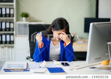 Asian woman is stressed, bored, and overthinking from working Asian woman is stressed, bored, and overthinking from working 134838138