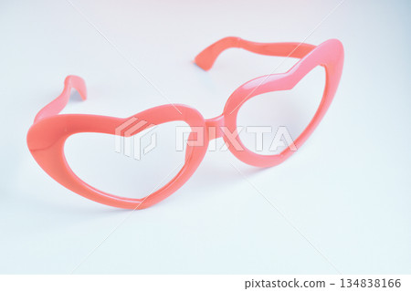pink heart shape of glasses on white background 134838166